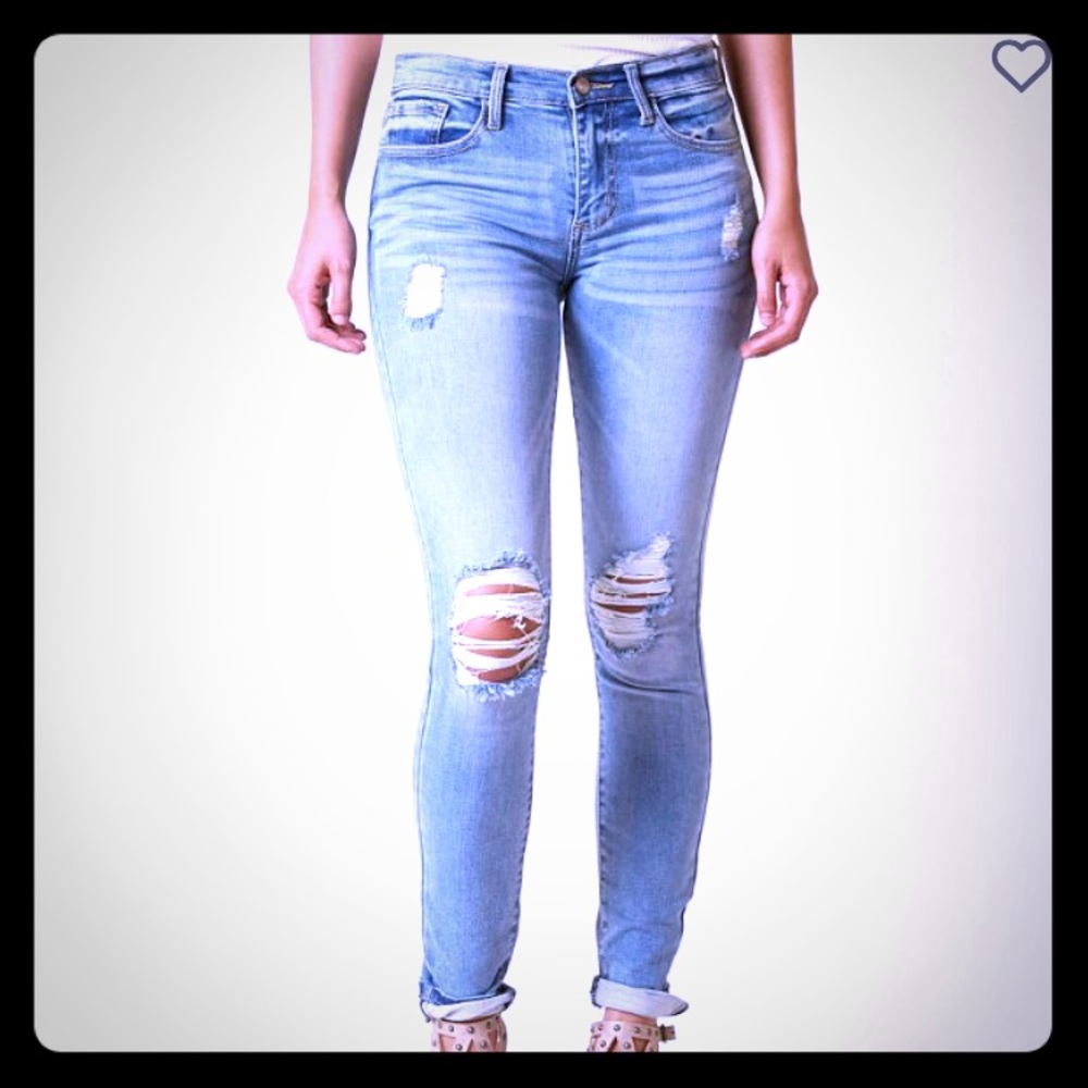 HELLAHECTIK busted knee skinny jeans
